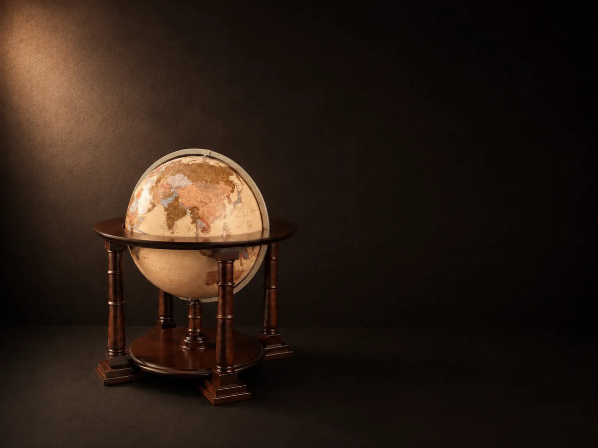 Zoffoli Sirio: Apricot floor globe with a wooden frame against a dark studio background.