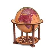 Zoffoli Aries: Ochre and Burgundy floor globe with a wooden frame and decorated lower shelf.