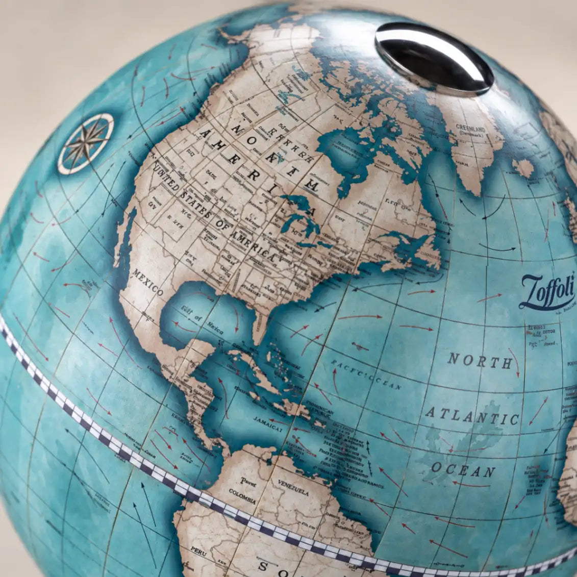 Zoffoli Bridge: close-up of the Indigo world map showing North America and the globe's top opening.
