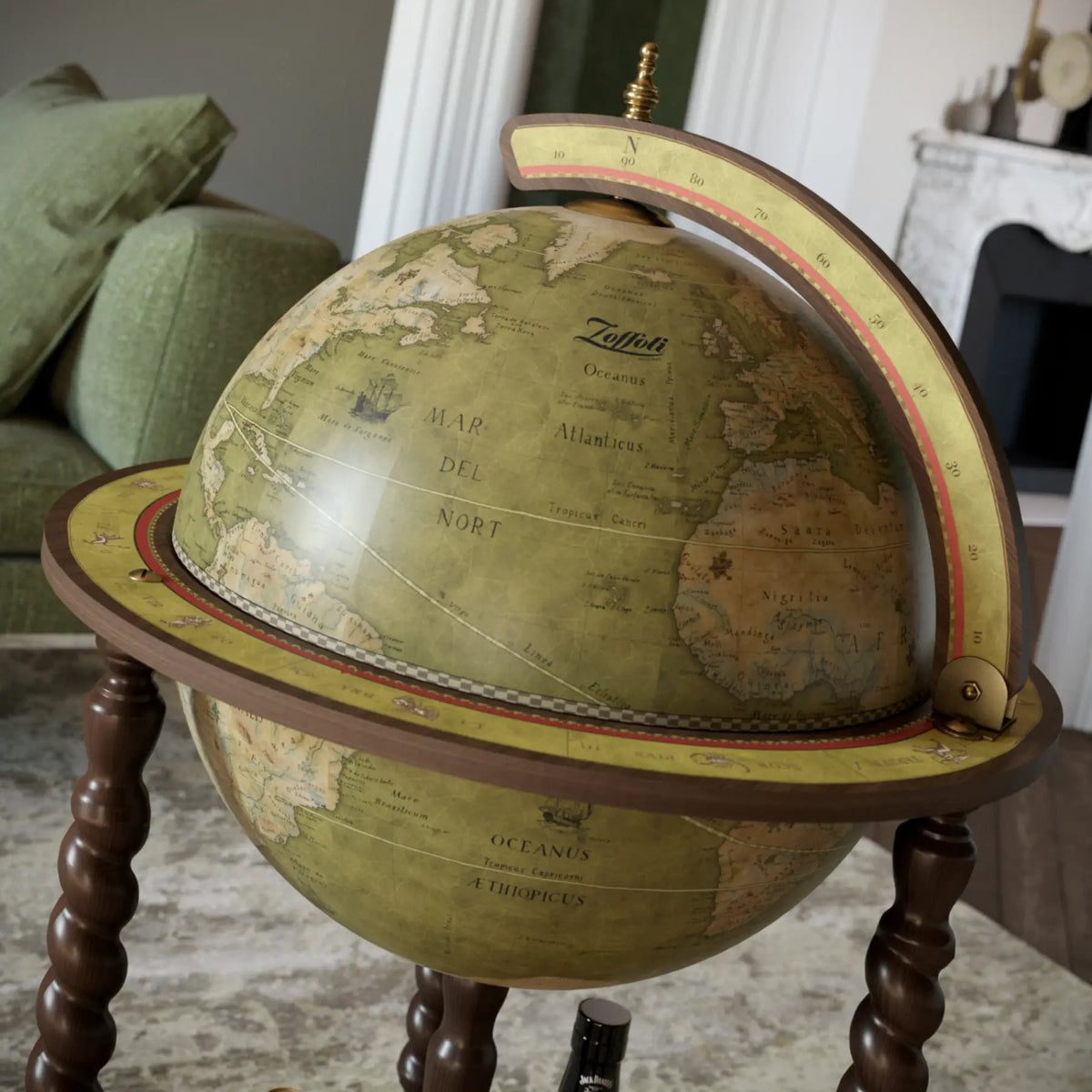 Zoffoli Explora: Olive Green sphere and wooden ring viewed from above beside a sofa.