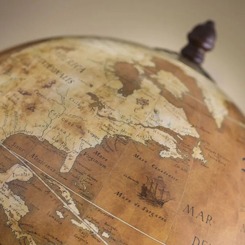 Zoffoli Giove: detail of the brown world map and top finial.
