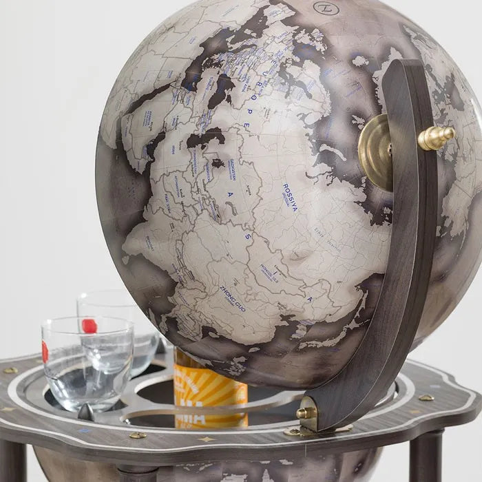 Zoffoli Lapis: globe bar with the upper hemisphere raised, showing the map and drinks tray.