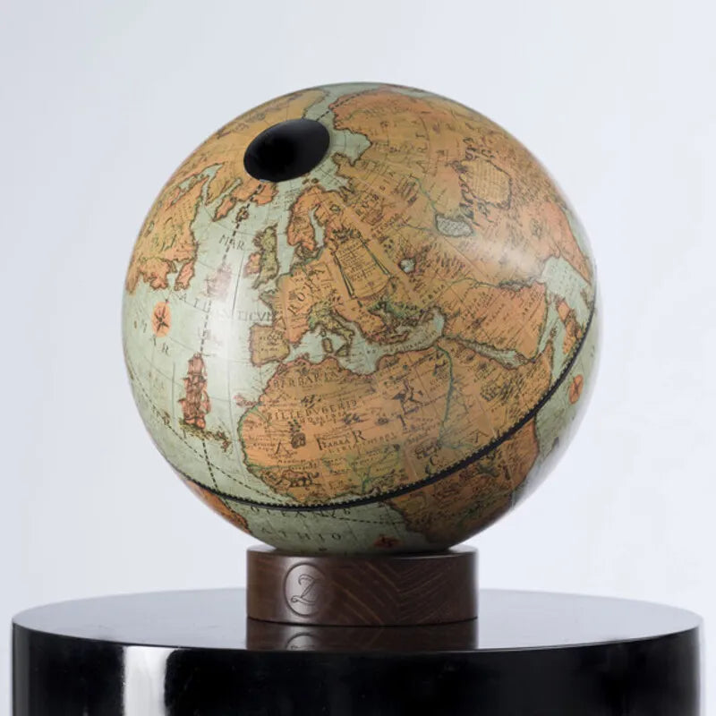 Zoffoli Orbis: Laguna tabletop globe with a green-toned map and wooden base.