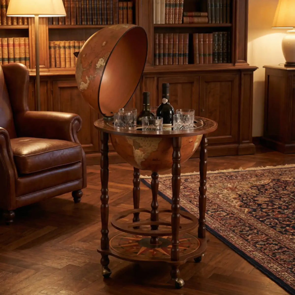 Zoffoli Petra: open globe bar stocked with drinks in a warm library beside a leather chair.