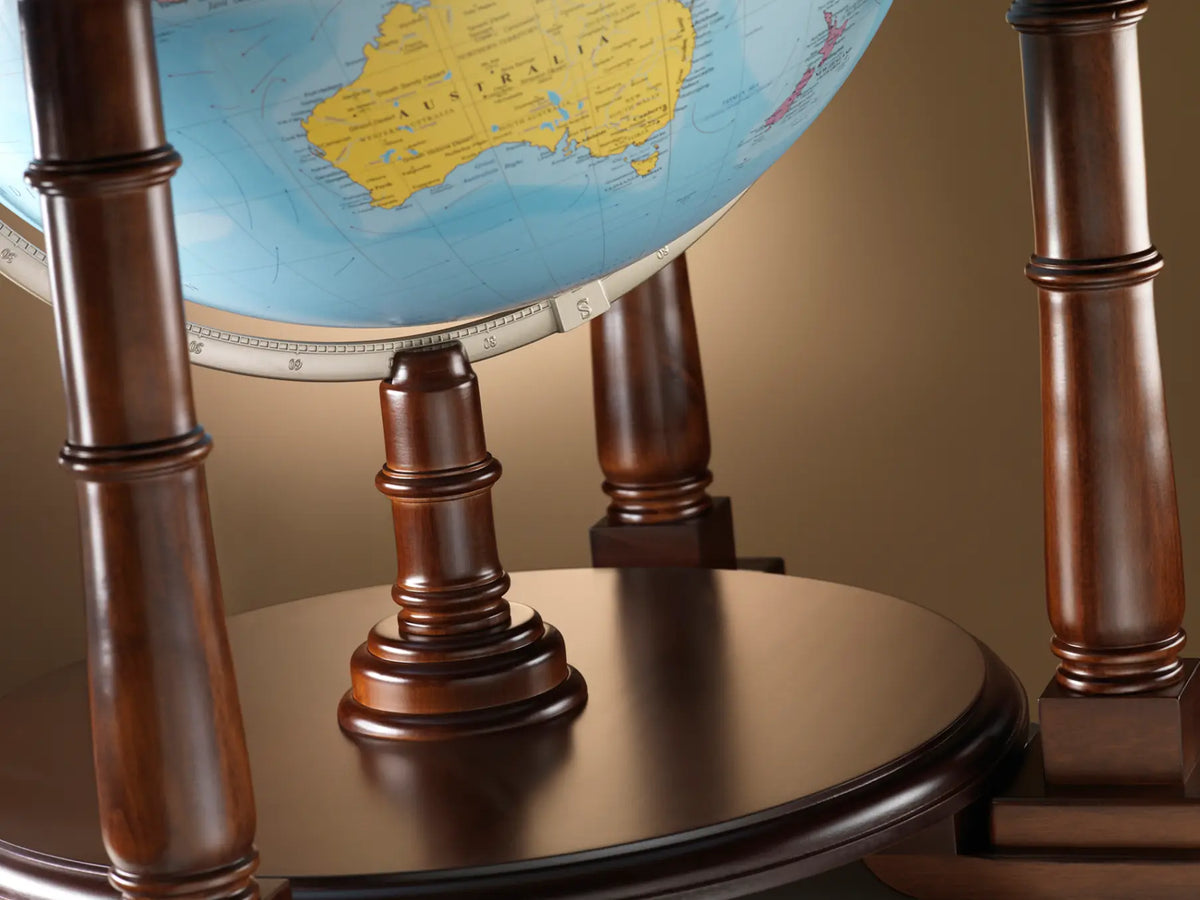 Zoffoli Sirio: close-up of the blue globe, metal meridian and wooden lower shelf.