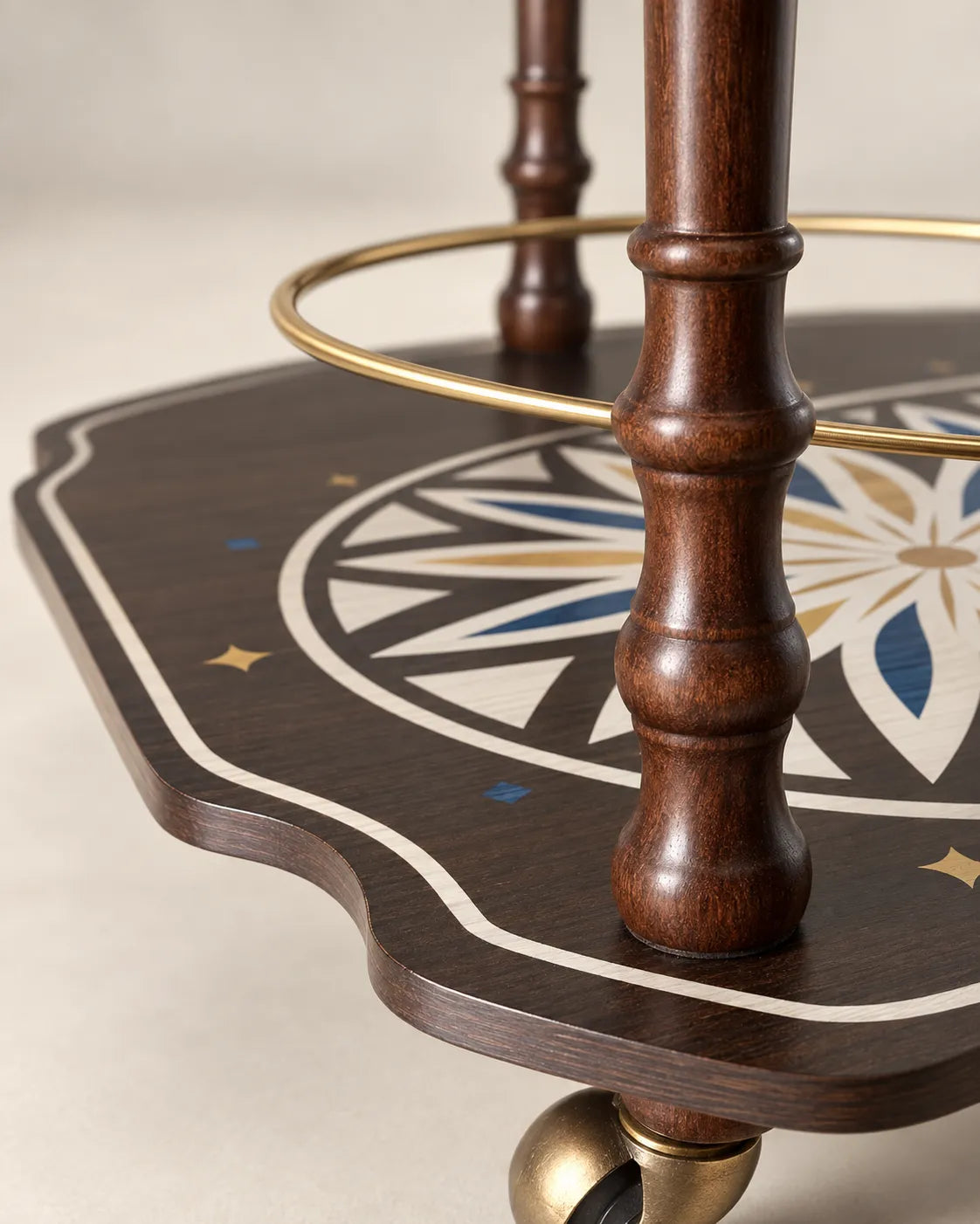 Zoffoli Vesuvio: detail of the wooden legs, compass rose lower shelf and trolley wheels.