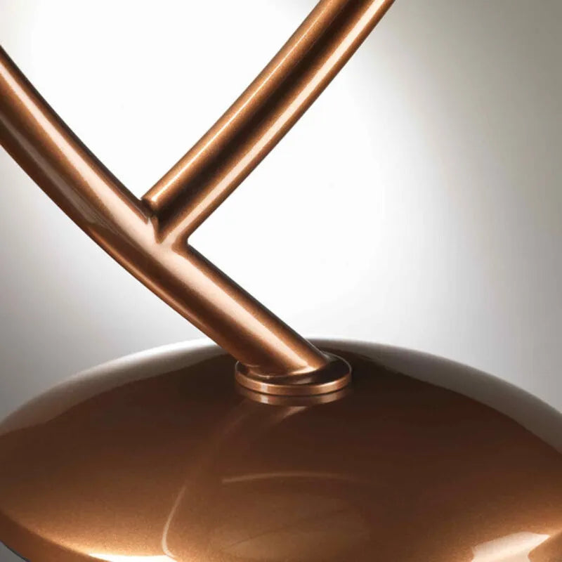 Zoffoli Vega: close-up of the copper-coloured supports meeting the circular base.