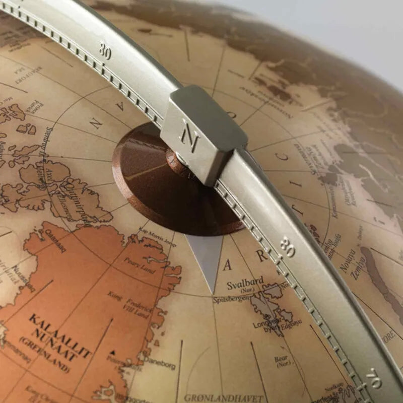 Zoffoli Vega: close-up of the warm-toned world map and numbered meridian ring.