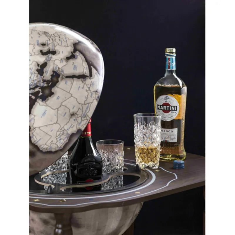 Zoffoli Vesuvio: close-up of the monochrome globe, whisky bottle and glasses on the side tray.