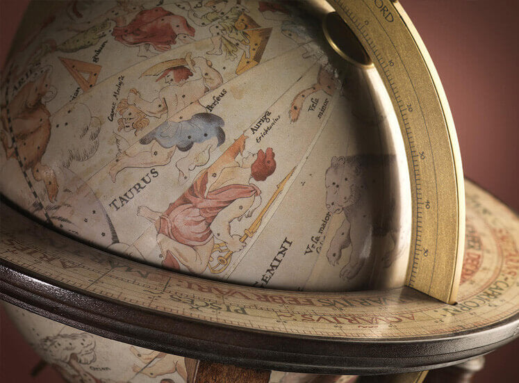 Dettaglio della cartografia storica e del meridiano di un mappamondo Zoffoli.