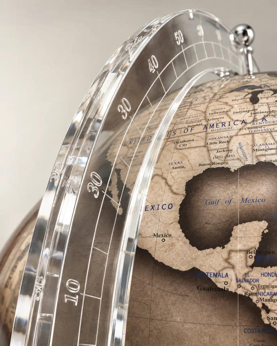 Zoffoli Elegance: close-up of the Noir globe's map and transparent numbered meridian.